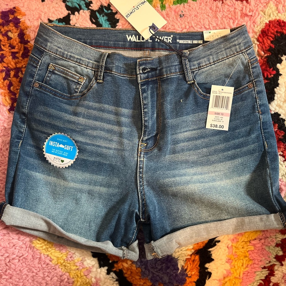 BNWT stretchy shorts, size 13. Fits large-XL